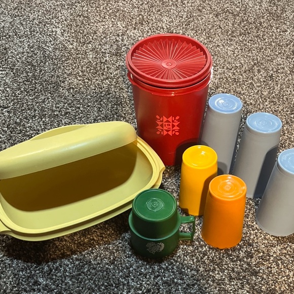 Other - Assorted Tupperware pieces. Cups, canister with lid, serving dish with lid